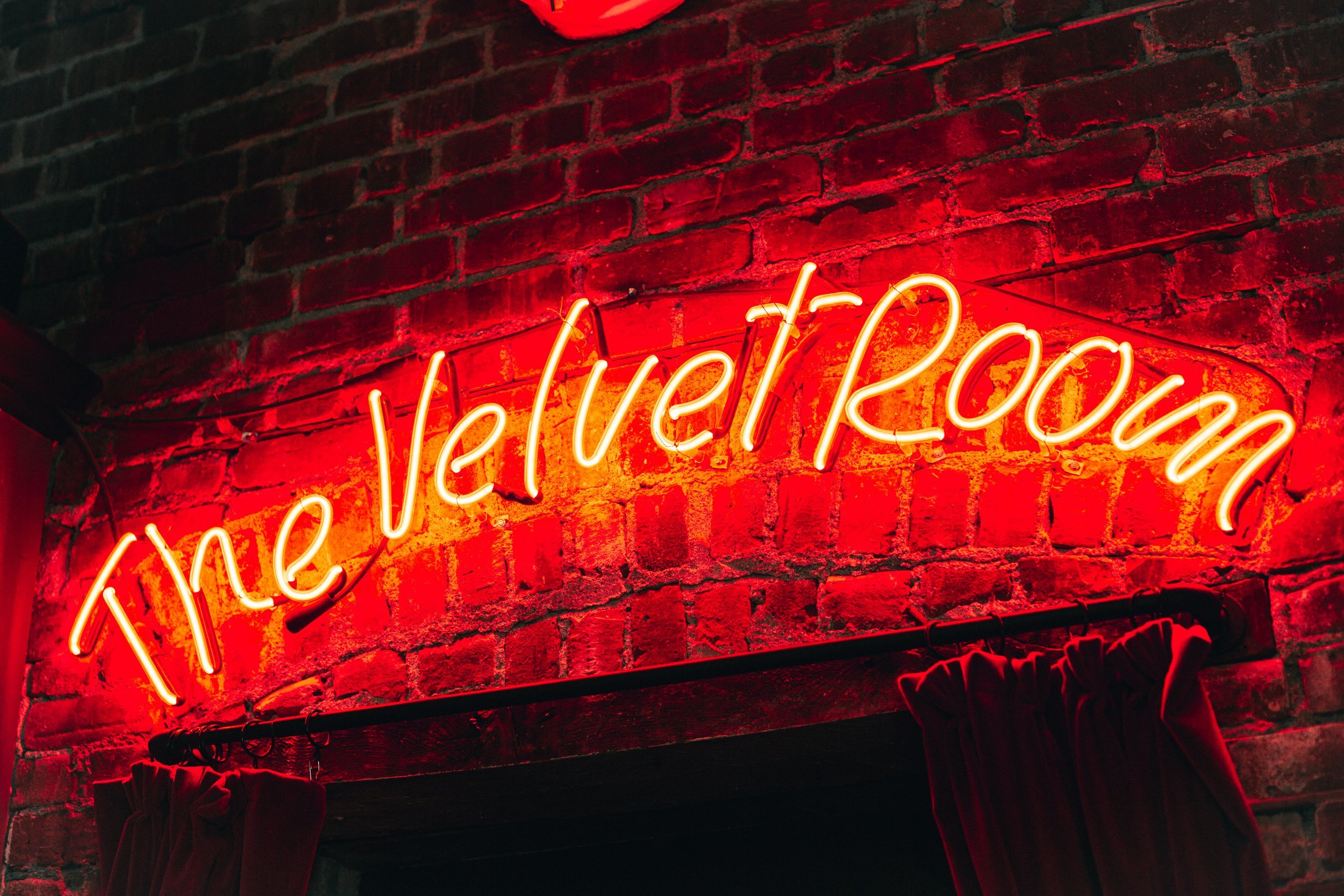 The Velvet Room neon sign