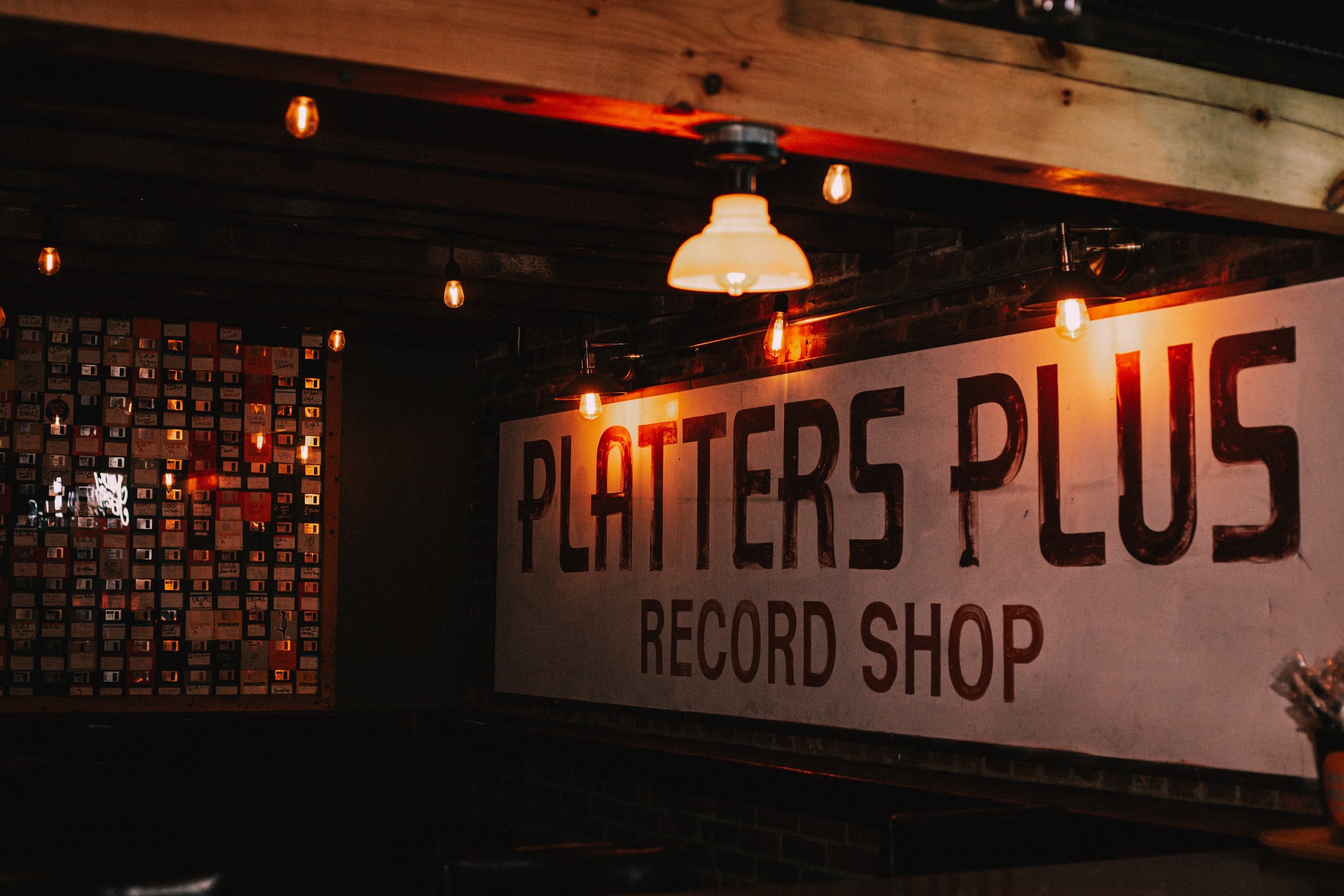 Platters Plus Record Shop sign